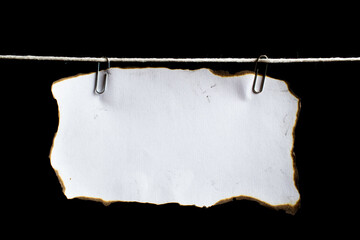 white sheet of paper on a black background