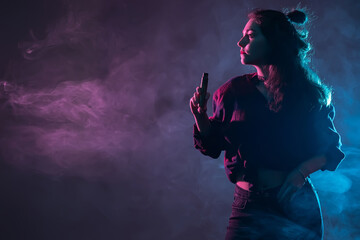 The girl with the vape. Smoking girl. Close-up of a woman inhaling an e-cigarette. The concept of night life. A woman with an e-cigarette in her hands on a dark smoky background. Space for text.