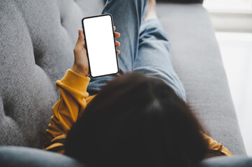 Woman using mobile smartphone and device white screen empty space smart phone, clipping path included