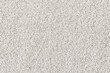 White curly wool seamless texture background. texture with short factory material.