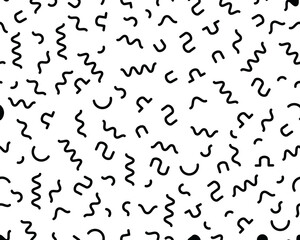 Seamless pattern with black confetti on a white background