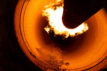 Close Up Of Flame In Rotary Kiln During Heating Mode In Cement Plant