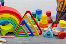 Multicolored Wooden Rainbow Toy, Sorter, Pencils, Blocks On Wooden Table. Back To School, Games For Kindergarten, Preschool Education. 