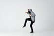 © SHOTPRIME STUDIO - man hiding face in mask hooded sneaking stealing isolated background