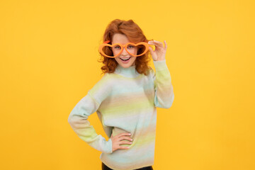 posing for photo. positive emotions. cheerful lady on yellow background. funny redhead woman