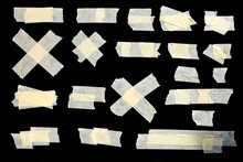 Collection Of Adhesive Tape Pieces On Black Background
