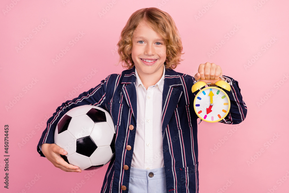 Photo of young school boy happy positive smile hold soccer ball watch ...