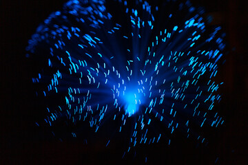 Wall Mural - blue abstract particles and lines with bokeh and blur in dark background.