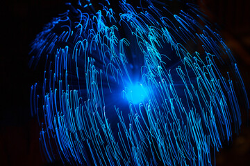 Wall Mural - blue abstract particles and lines with bokeh and blur in dark background.