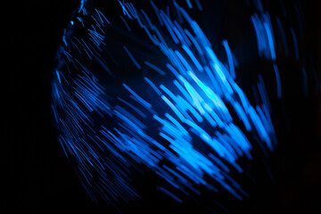 Wall Mural - blue abstract particles and lines with bokeh and blur in dark background.