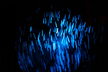 Wall Mural - blue abstract particles and lines with bokeh and blur in dark background.