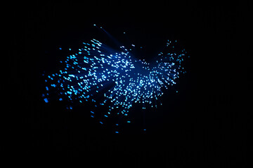 Wall Mural - blue abstract particles and lines with bokeh and blur in dark background.