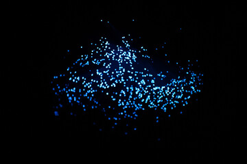 Wall Mural - blue abstract particles and lines with bokeh and blur in dark background.