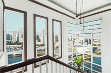 The Stairwell Of An Upscale Loft Condo Unit With Views Of Miami Skyline. Interior Of A Luxury Real Estate Property In South Florida.