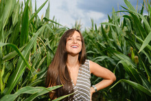 Young Woman Standinfgin The Corn Field