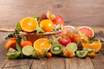 Wall Mural - assorted of fresh fruit with orange, kiwi, apple and pomegranate