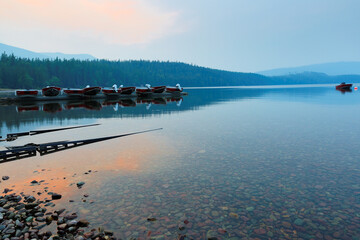 Wall Mural - Overview of Lake McDonald after sunset . Lake McDonald is the largest lake in Glacier National Park in Flathead County in the U.S. state of Montana