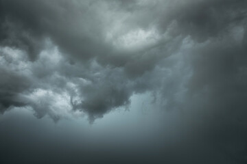 Wall Mural - dramatic storm clouds in rainy season, black and dark sky with clouds