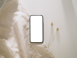 Smartphone mockup, Phone with blank screen template. Flat lay, Minimalist styled.