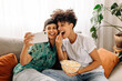 © (JLco) Julia Amaral - Cheerful couple taking a selfie together at home
