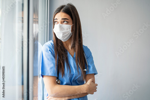 Portrait of sadness healthcare worker woman crying after failure and tired from work because impact from covid-19 pandemic outbreak. Serious, overworked, female health care worker