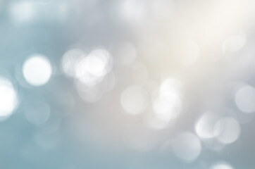 Wall Mural - blurry background with round particles in blue shades