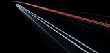 Fototapeta Kwiaty - lights of moving cars at night. long exposure