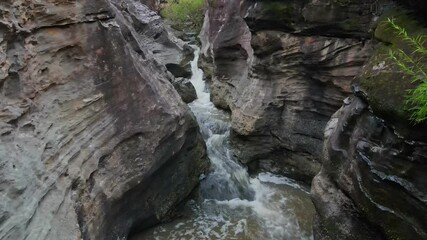 Poster - beautiful waterfall in the middle of  stone,drone view