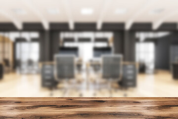 Desk in black-and white office with wooden floor. Product display.