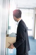 © 상은 신 - Fired businessman leaving office with box of belongs