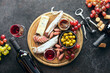 Wine tasting set with a charcuterie board, overhead view