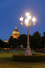 Wall Mural - Saint Petersburg. Saint Isaac's Cathedral. Museums of Petersburg. St. Isaac's Square. Summer in St. Petersburg. St. Isaac's Cathedral in the crowns of trees. Russia.