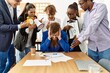 © Krakenimages.com - Group of business workers screaming to stressed partner at the office.