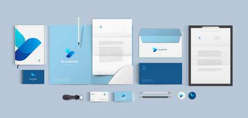 top view stationery design mock up set for corporate identity or branding on table. blue color style