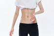 woman pulls in belly strip waist diet health slimming
