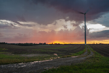 Wall Mural - wind turbines during the evening storm