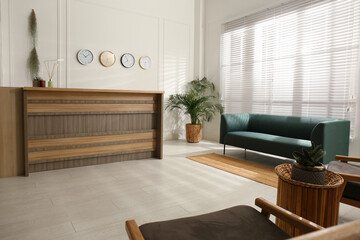 Wall Mural - Hotel lobby interior with wooden reception desk. Stylish workplace