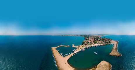 Wall Mural - Wide panorama. Aerial view of the bay, ships and boats. Touristic place, ancient buildings, the Colosseum and the Temple of Apollo. Turkey, Manavgad, Side. Copy space