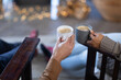 © Wavebreak Media - Happy diverse couple in living room holding mugs and drinking coffee