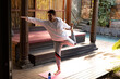 © Wavebreak Media - Caucasian man wearing sportswear and practicing yoga standing on yoga mat