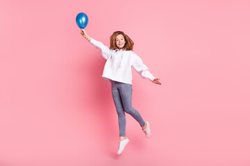 Sticker - Full length body size view of attractive trendy cheerful girl jumping having fun with helium ball isolated over pink pastel color background