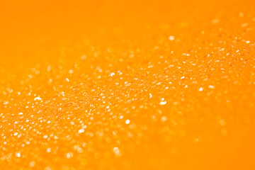 Water drop on glass abstract background. orange background , Orange bokeh.