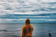 © consider_me_jealous - person sitting on the pier