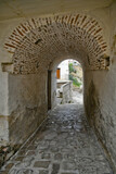 Fototapeta Na drzwi - A street in the historic center of Aliano, a old town in the Basilicata region, Italy.