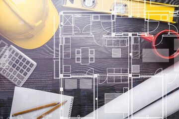 Wall Mural - Yellow helmet with a blueprint on wooden background