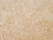 Beige color natural stone wall texture for background or backdrop. Vintage pattern of natural stone wall surface material. Background for design and decoration. Detail for wallpapers and tiles..