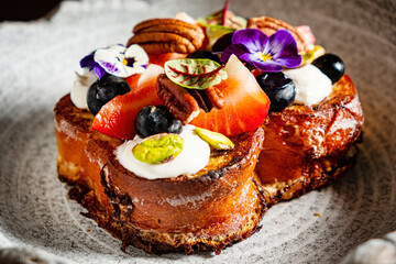 Canvas Print - Homemade brioche toast with blueberries, almonds and toasted bread.