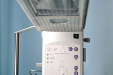 Wall Mural - A device for resuscitation of infants and checking the child on the Apgar scale after delivery. Machine for oxygen supply and resuscitation of the baby after childbirth
