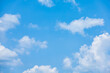 © Vipada - Blue sky with fluffy cumulus clouds floating in summer day. Pure white soft cloudscape scene, beautiful abstract in the air. Cloudy space view background. Tranquil environment, nature outdoor.