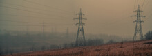 The Majestic Panorama Of The Power Plant In The Fog